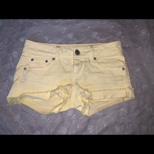 Yellow denim shorts